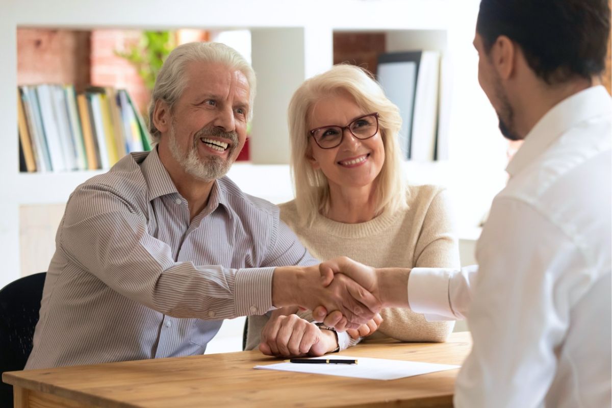 Australian couple meeting with a mortgage broker at home